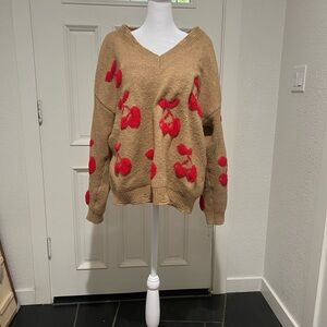 Kori Beige V-Neck Sweater with Cherry Red Accents